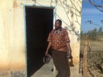 Teacher in doorway. Termites ate the door....