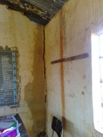 water stains the walls as it runs down inside the classrooms.