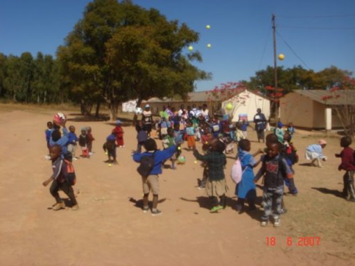 pre-school children playing with toys sent out from UK