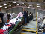 the initial sorting of the clothes when they arrive at the factory